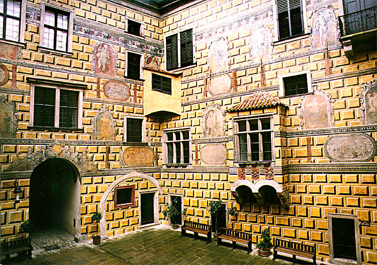 Mural on IV. courtyard of Český Krumlov Castle, details of figural decoration above oriel