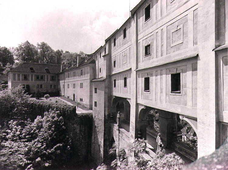 Connecting corridor - section leading from Renaissance House and Castle Theatre on the 5th courtyard of Český Krumlov Castle in two floors above the Cloak Bridge, historical photo