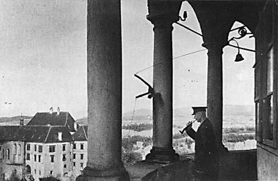 Český Krumlov Castle fanfares, trumpeter and crier on the Castle Tower  